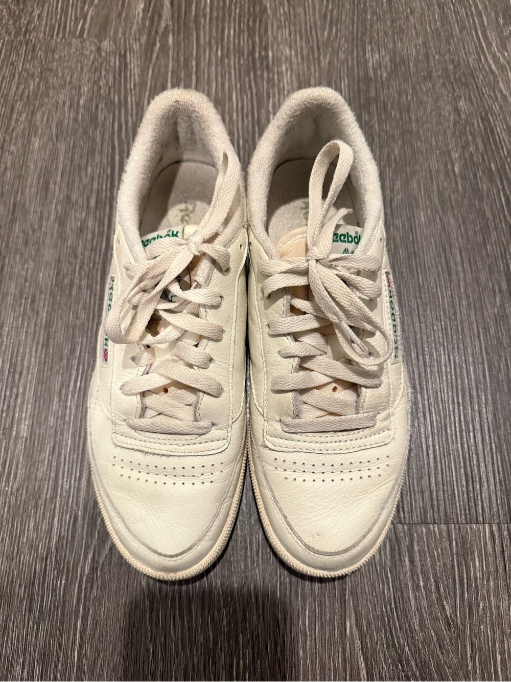 Reebok Women's Cream Leather Sneakers with Green Logo Accent